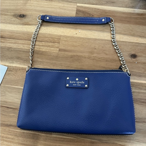 Kate spade purse like new, the color is purple 💯 leather - Picture 1 of 3